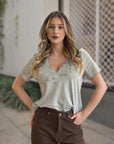 T-SHIRT SOUVENIR COM TACHAS